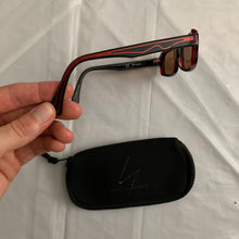 Load image into Gallery viewer, 2000s Yohji Yamamoto Black Rectangular Sunglasses with Vibrant Red Wiring - Size OS