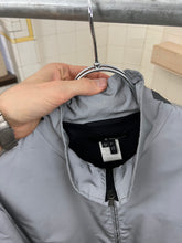 Load image into Gallery viewer, 2000s Samsonite 'Travel Wear' Reflective Glass Jacket - Size XL