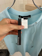Load image into Gallery viewer, 2000s Samsonite ‘Travel Wear’ Tee with Built in Glasses Cords - Size XS