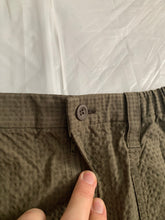 Load image into Gallery viewer, ss2000 Issey Miyake Dark Khaki Textured Nylon Bunge Hem Skirt - Size M