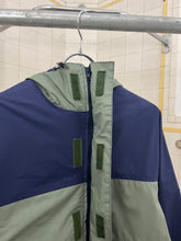 Load image into Gallery viewer, 1990s Mickey Brazil Colorblock Rain Jacket - Size L
