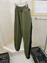 Load image into Gallery viewer, 1990s Vintage Destroy Olive Two-Tone Nylon Cotton Sweatpants - Size L