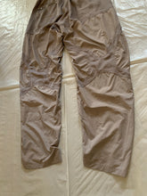 Load image into Gallery viewer, ss2005 Issey Miyake Soft Blush Twist Calf Paneled Technical Pants - Size M
