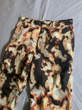 Load image into Gallery viewer, aw2010 Issey Miyake Articulated Twist Knee Nylon Lava Graphic Pants - Size L