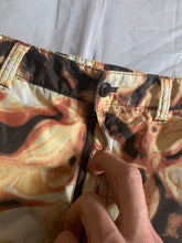 Load image into Gallery viewer, aw2010 Issey Miyake Articulated Twist Knee Nylon Lava Graphic Pants - Size L