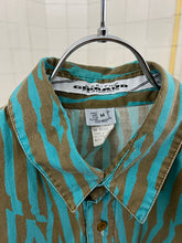 Load image into Gallery viewer, 1990s Marithe Francois Girbaud Camo Print Button Up Shirt - Size M