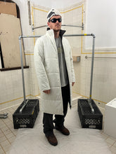 Load image into Gallery viewer, 2000s Samsonite ‘Travel Wear’ Long Hooded Puffer Parka - Size M