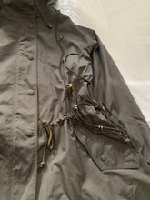 Load image into Gallery viewer, ss2004 Issey Miyake Military Khaki Bungee Cord Long Raincoat - Size M